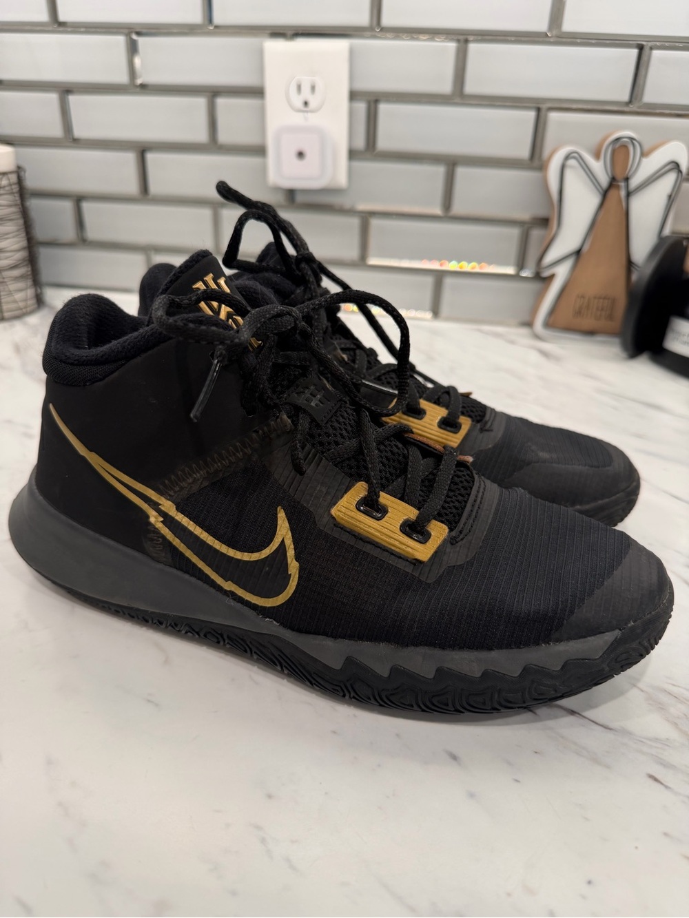 Nike Black and Gold Basketball Shoes